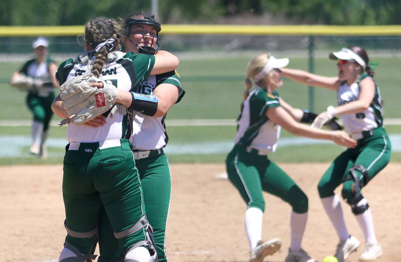 North Boone’s Vikings celebrate a win over Richmond-Burton during Class 2A softball sectional final action at Marengo Saturday.