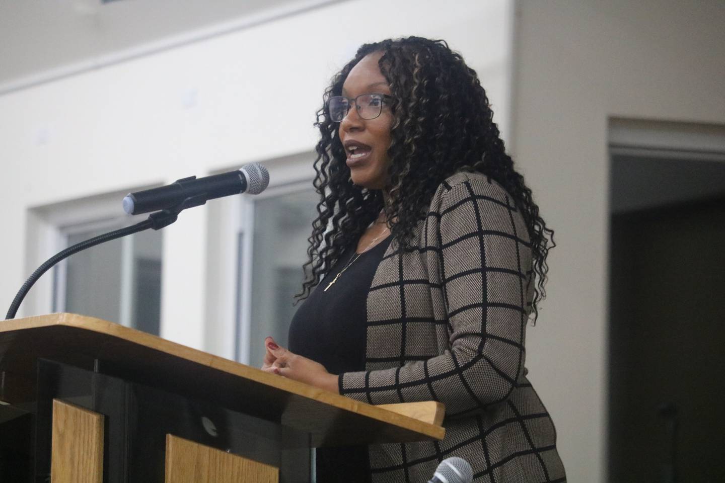 Quiana Jones speaks Nov. 6, 2023 at the DeKalb County Community Mental Health Board Town Hall meeting held at New Hope Missionary Baptist Church in DeKalb.