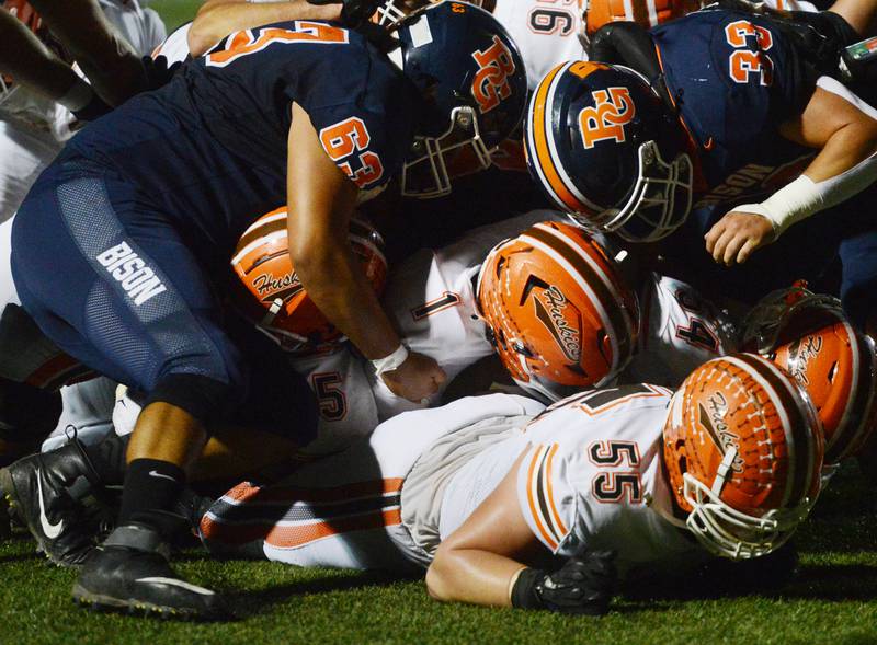 Joe Lewnard/jlewnard@dailyherald.com
Hersey quarterback Colton Gumino (1) scores a touchdown during the first quarter of Friday’s game at Buffalo Grove.