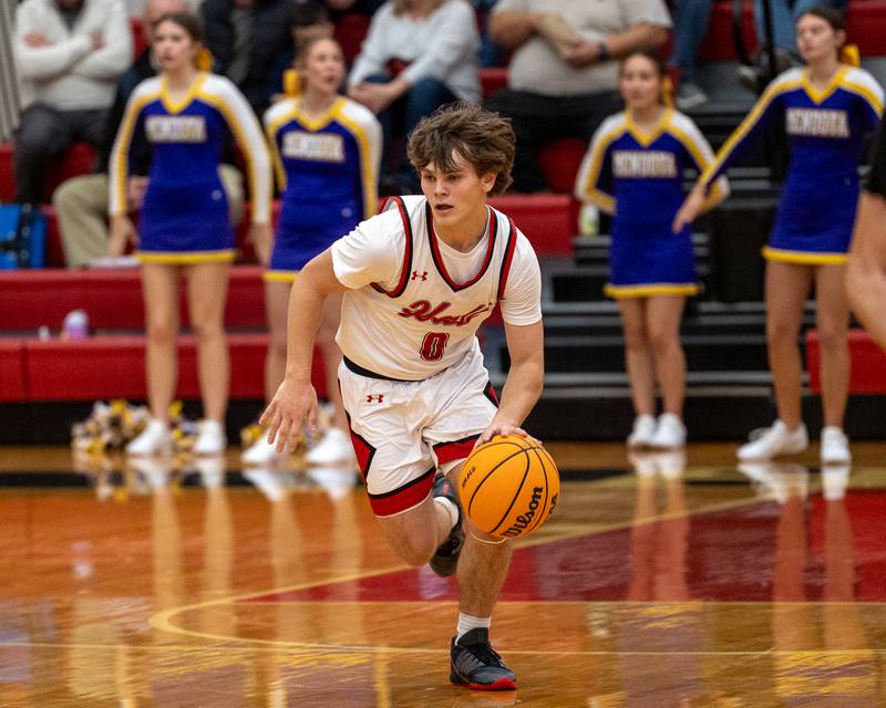 Greyson Bickett (0) of Hall dribbles ball down court on Saturday, December 20, 2025 at Hall High School in Spring Valley.