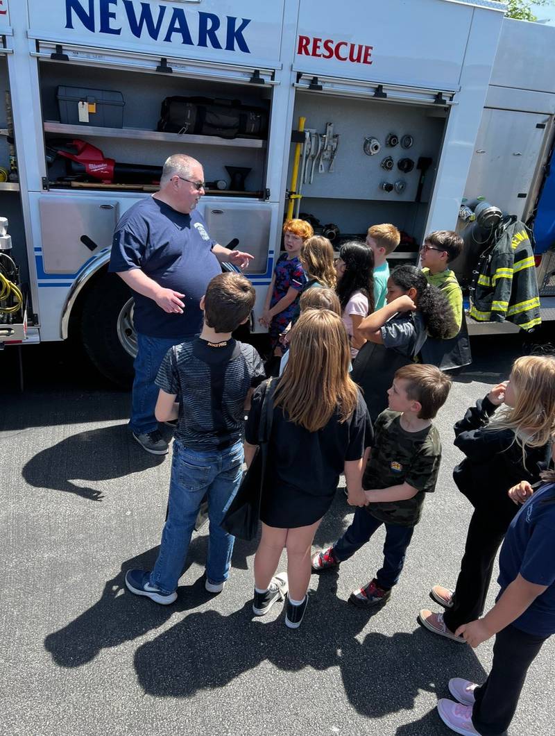 Newark Grade School participated in Camp 911 on May 9, a program begun in 2015 by retired Newark School District nurse Karen Sapsford. Firefighters and EMTs from the Newark Fire Department along with deputies from the Kendall County Sheriff's Office brought their equipment to show students, while nurses from Rush Copley Medical Center in Yorkville taught students first aid.
