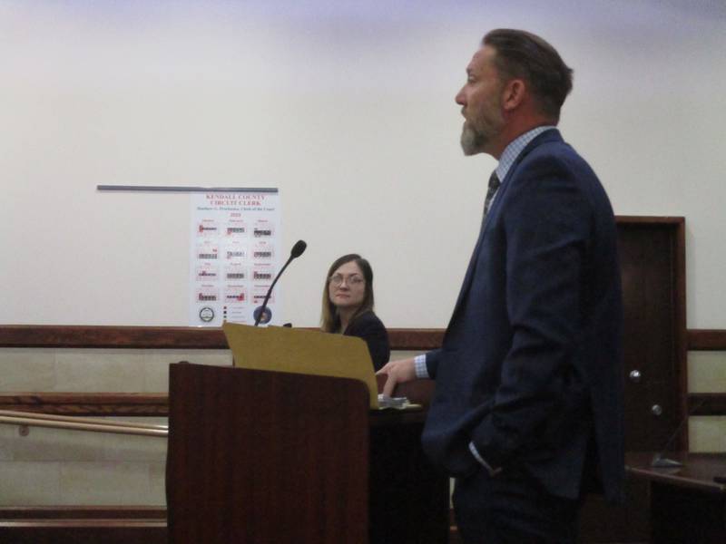 Megan Lamb, attorney for the Yorkville Electoral Board, listens as Richard Warner, attorney for the objector in the Yorkville Ward 3 nominating petition challenge, speaks in a Kendall County courtroom on Feb. 15, 2023.