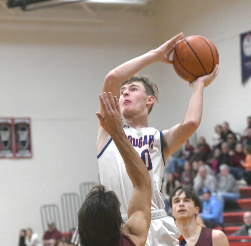 Eastland's Max McCullough shoots against Dakota during Saturday action against Lena-Winslow at the 61st Forreston Holiday Tournament.