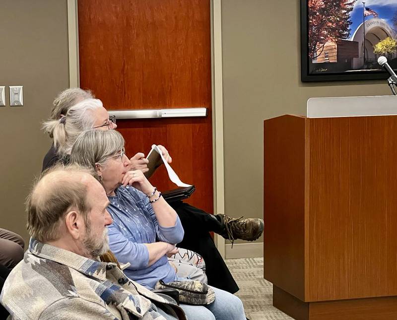 Joe and Pam Machan sit with other Sterling residents at an open house on April 8, 2025, to discuss aspects of the city's Second Street road construction project.