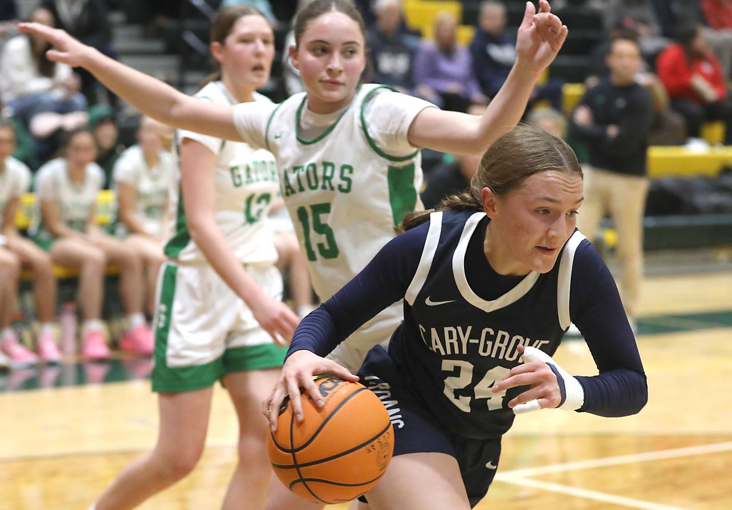 Cary-Grove's Aria Stanton drive the baseline against Crystal Lake South's Tessa Melhuish during a Fox Valley Conference girls basketball game on Friday, Jan. 23, 2026, at Crystal Lake South High School.