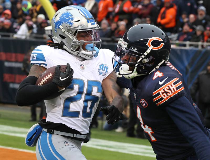 Detroit Lions running back Jahmyr Gibbs gets by Chicago Bears safety Eddie Jackson for a touchdown during their game Sunday, Dec. 10, 2023 at Soldier Field in Chicago.