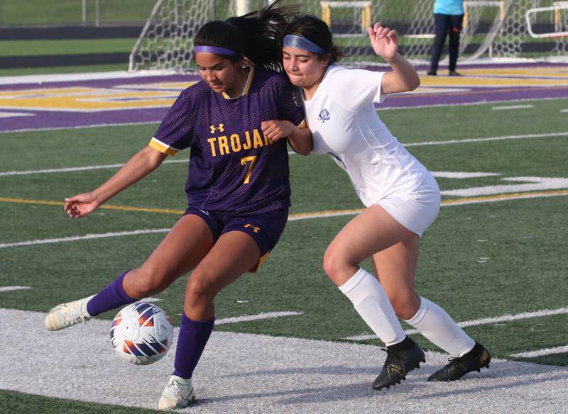 Mendota's Crystal Garcia keeps the ball away from Princeton's Xiomara Cortez during the Class 1A Regional semifinal game on Tuesday, May 9, 2023 at Mendota High School.