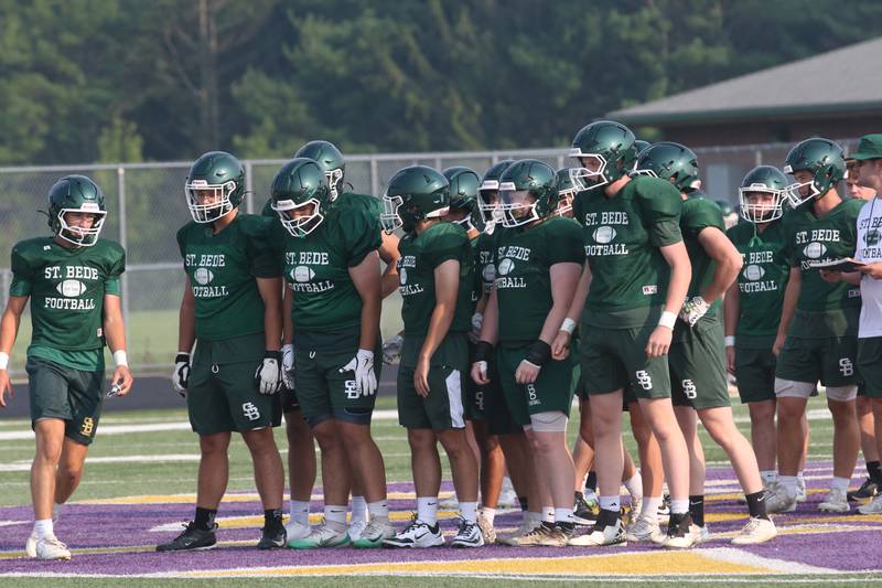 Members of the St. Bede football team huddle during a joint practice on Thursday, July 31, 2025 at Mendota High School.