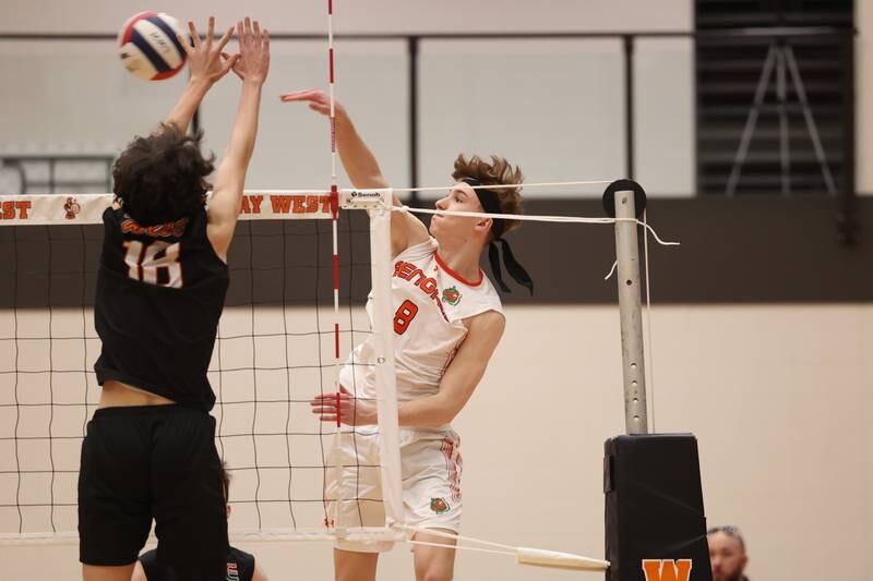 Plainfield East’s Ethan Berry powers a shot down the line against Lincoln-Way West on Wednesday, March 22nd. 2023 in New Lenox.