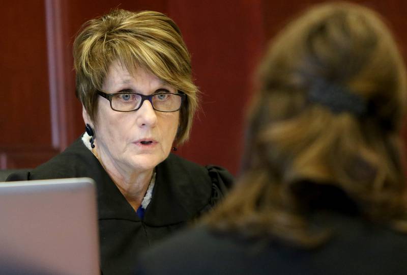 Judge Robbin Stuckert talks with First Assistant State's Attorney Stephanie Klein during a motion for continuance in the state's case against Katie Petrie on Thursday, Jan. 25, 2018 at the DeKalb County Courthouse in Sycamore.