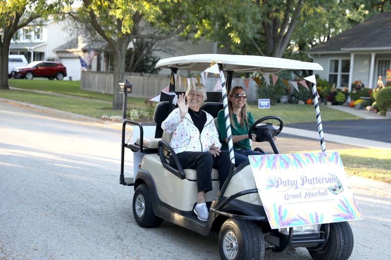 Patsy Patterson, the first women’s tennis coach at Kaneland High School, serves as the grand marshall in the  the school’s homecoming parade on Wednesday, Oct. 2, 2024 in Elburn.