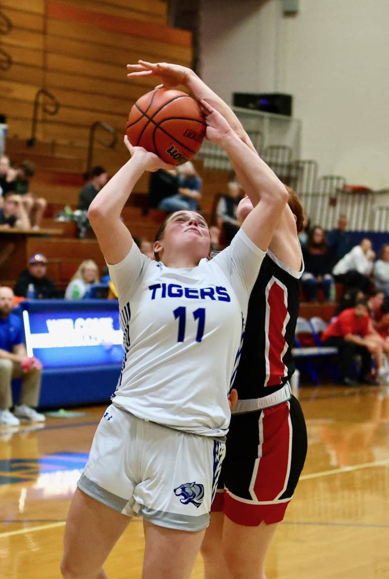 Princeton's Makayla Hecht shoots against Henry Tuesday night at Prouty Gym.
