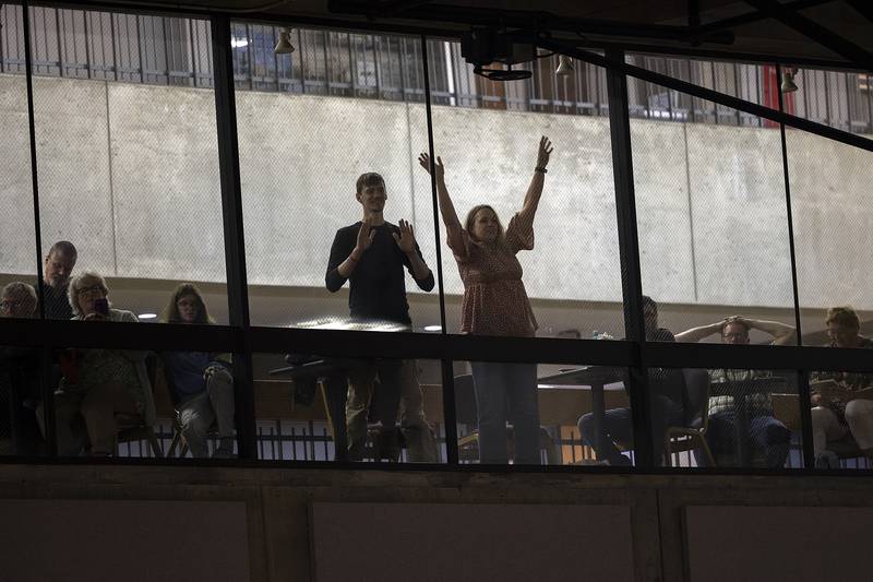 Loved ones wave to their graduates Friday, May 9, 2025, at Sauk Valley Community College’s commencement ceremony.