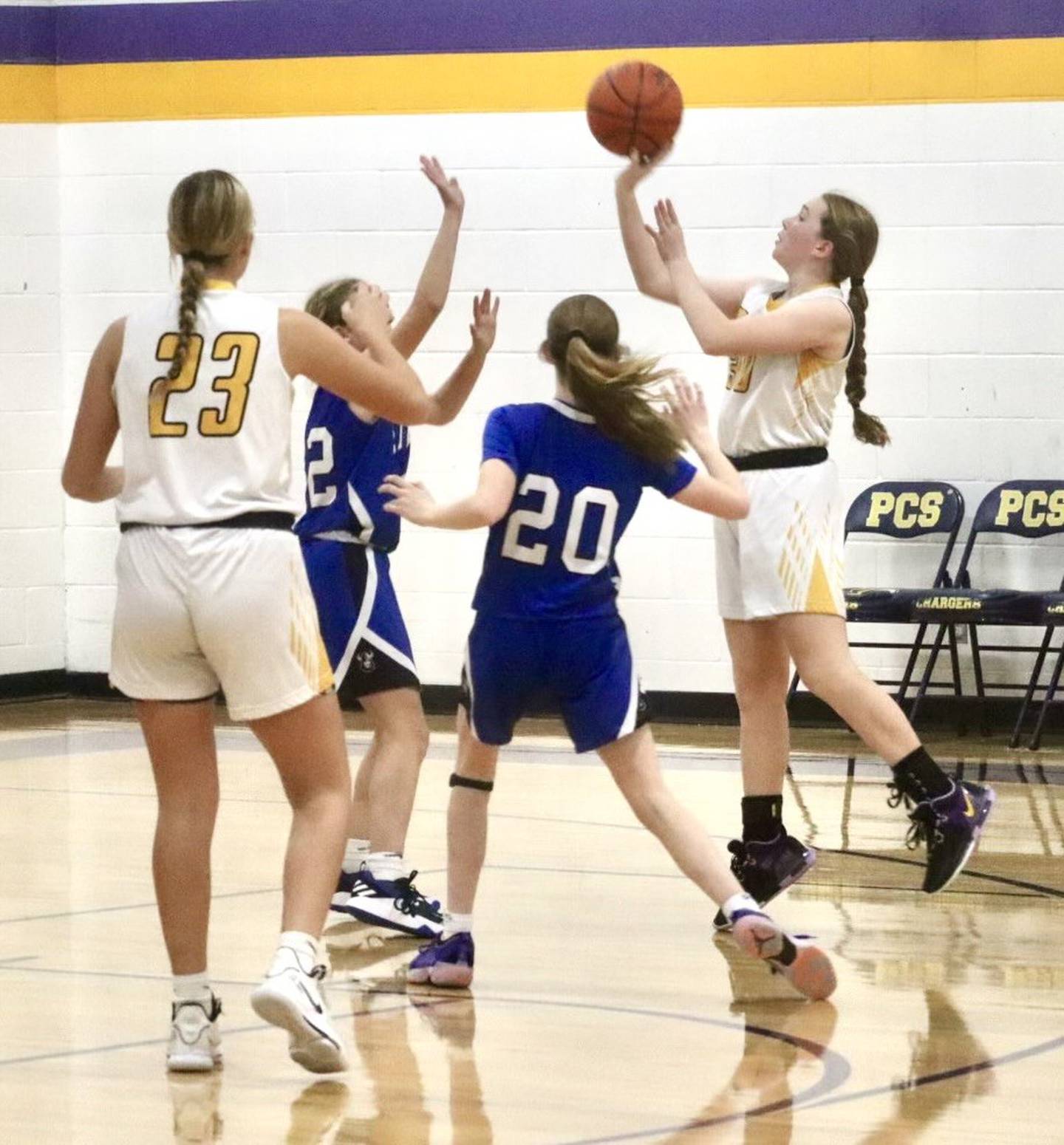 PC's Kami Nauman takes a shot during the sectional championship in Peoria. The Pumas beat Peoria St. Vincent de Paul, 30-24.