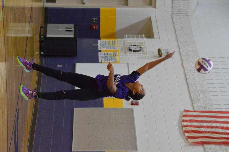 Rochelle's Deyonna Wallace serves the ball during a middle school eighth-grade match against Sterling.