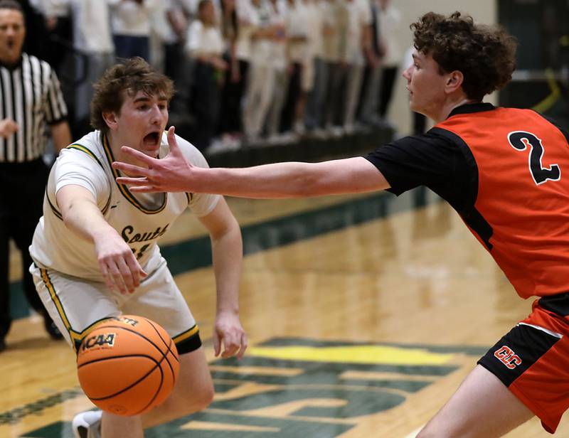 Crystal Lake South's Ryan Morgan passed the ball as he he is guarded by Crystal Lake Central's Danny Spychala during an IHSA Class 3A Crystal Lake South Regional boys basketball semifinal game on Wednesday, February, 25, 2026, at Crystal Lake South High School.