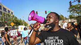 Photos: Eric Lurry protests circle city hall, JPD
