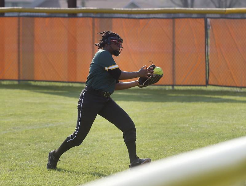 Crystal Lake South's Gabby Toussaint makes the catch as she chases down a fly ball during a Fox Valley Conference softball game Monday, May 9, 2022, between McHenry and Crystal Lake South at McHenry High School.