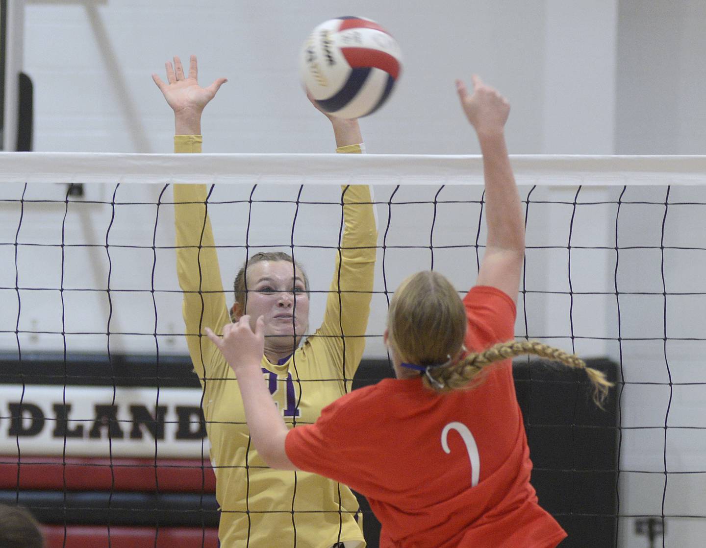 Serena’s Jenna Setchell (21) blocks Woodland’s Ella Derossett (2) during the opening set Tuesday, Sept. 5, 2023, at the Warrior Dome.
