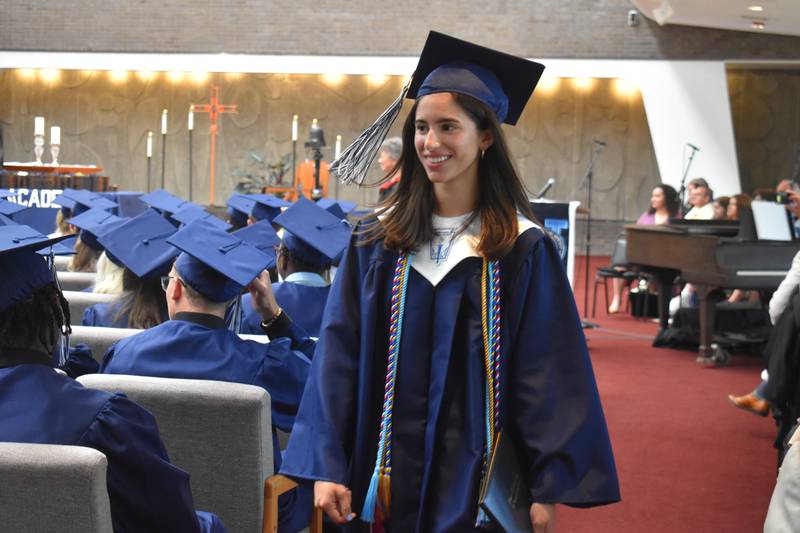 Diana Anos after receiving her diploma during Nazareth Academy’s commencement ceremony in La Grange Park on Sunday, May 21, 2023.