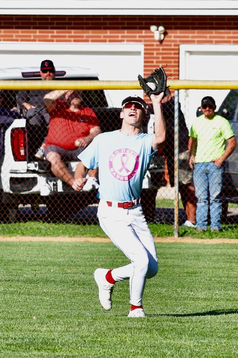 Hall's Braden Curran parks under a fly ball  Thursday at Kirby Park in Spring Valley. The Red Devils beat Princeton 4-1.
