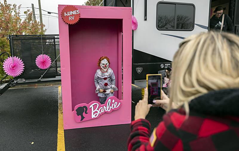 Not one to be outdone by Ken, Raiden Bausman, 5, has his photo taken by Kristina Kaecker Wednesday, Oct. 25, 2023 at the Sterling Police Department.