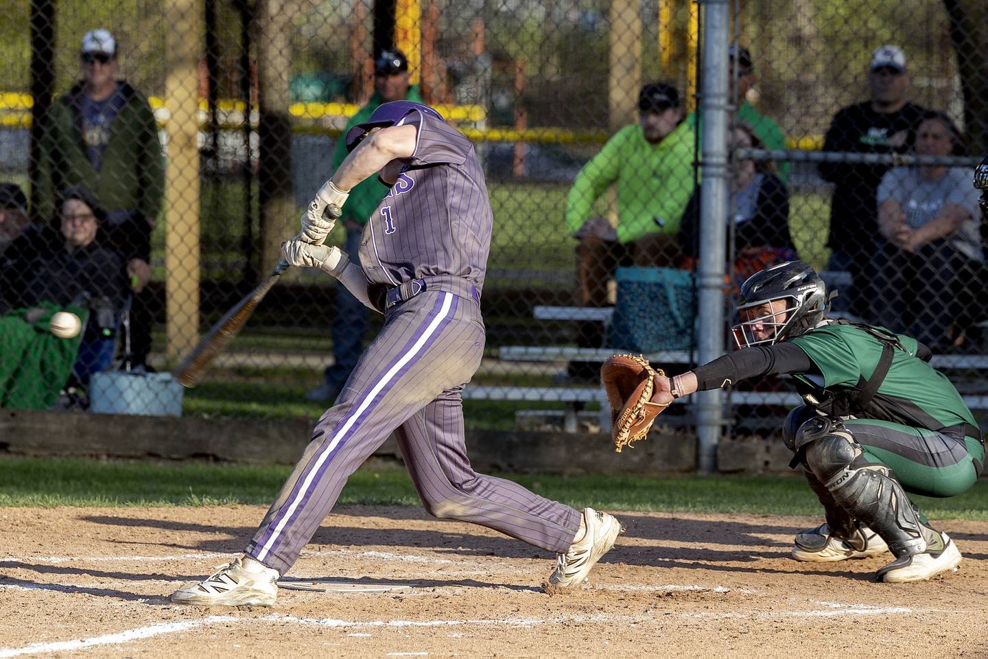 Dixon’s Jake Whelan drives in two with a single against Rock Falls Tuesday, April 29, 2025.