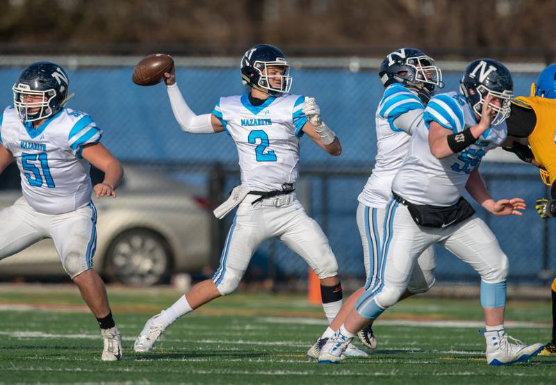 Nazareth Academy's J.J. McCarthy (2) throws a pass against Simeon in a 7A quarterfinal state playoff game in Chicago Nov. 10, 2018.