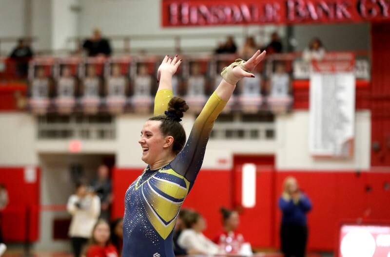 Lyons Township’s Emmy Bertucci competes on the balance beam during the Hinsdale Central Sectional on Monday, Feb. 10, 2025 in Hinsdale.