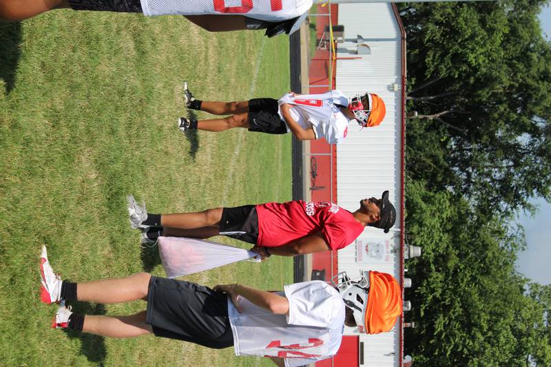 First-year Streator head football coach Jay Slone instructs his Bulldogs during summer practice Wednesday, July 16, 2025, at Doug Dieken Stadium in Streator.
