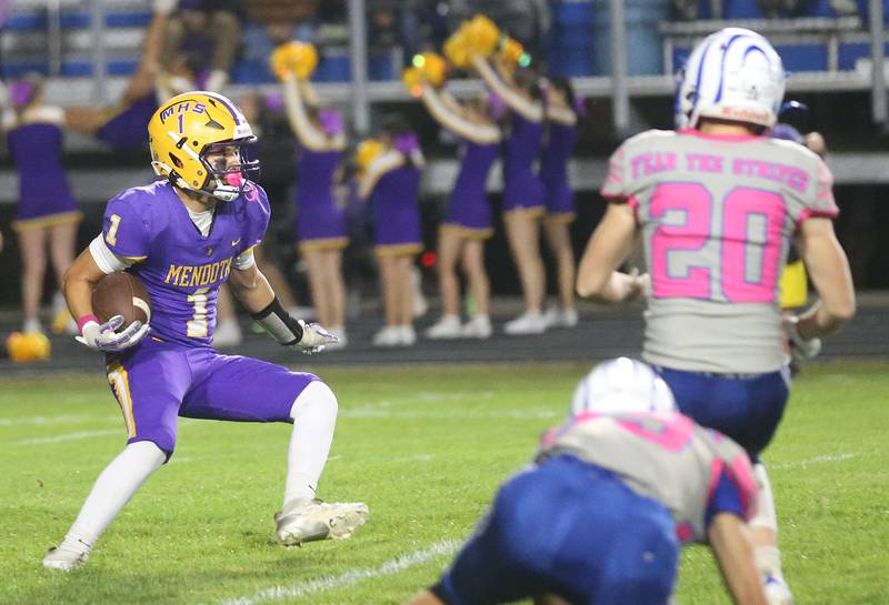 Mendota's Javier Hernandez runs with the ball as Princeton's Jace Weyer defends on Friday, Oct. 10, 2025 at Bryant Field in Princeton.