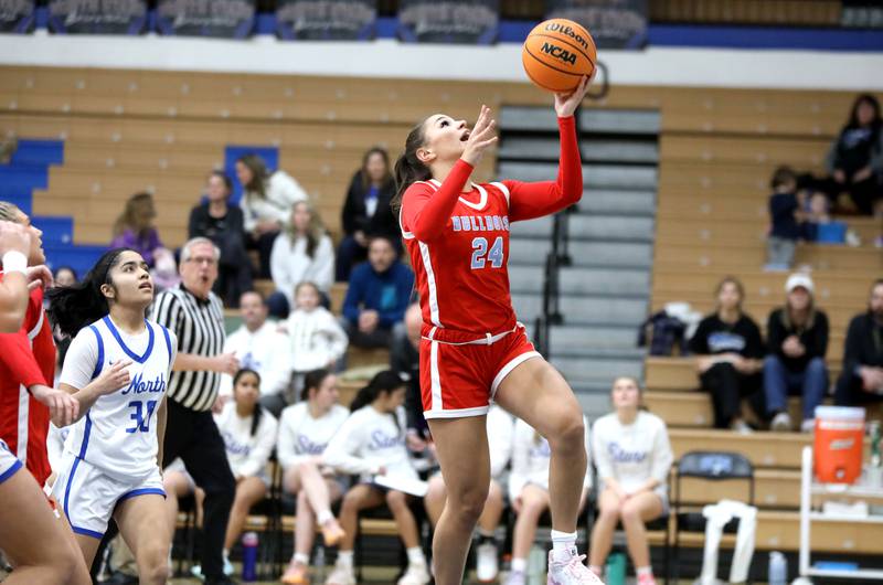 Batavia's Hallie Crane gets a shot up during a game against St. Charles North on Tuesday, Feb. 4, 2025 in St. Charles.