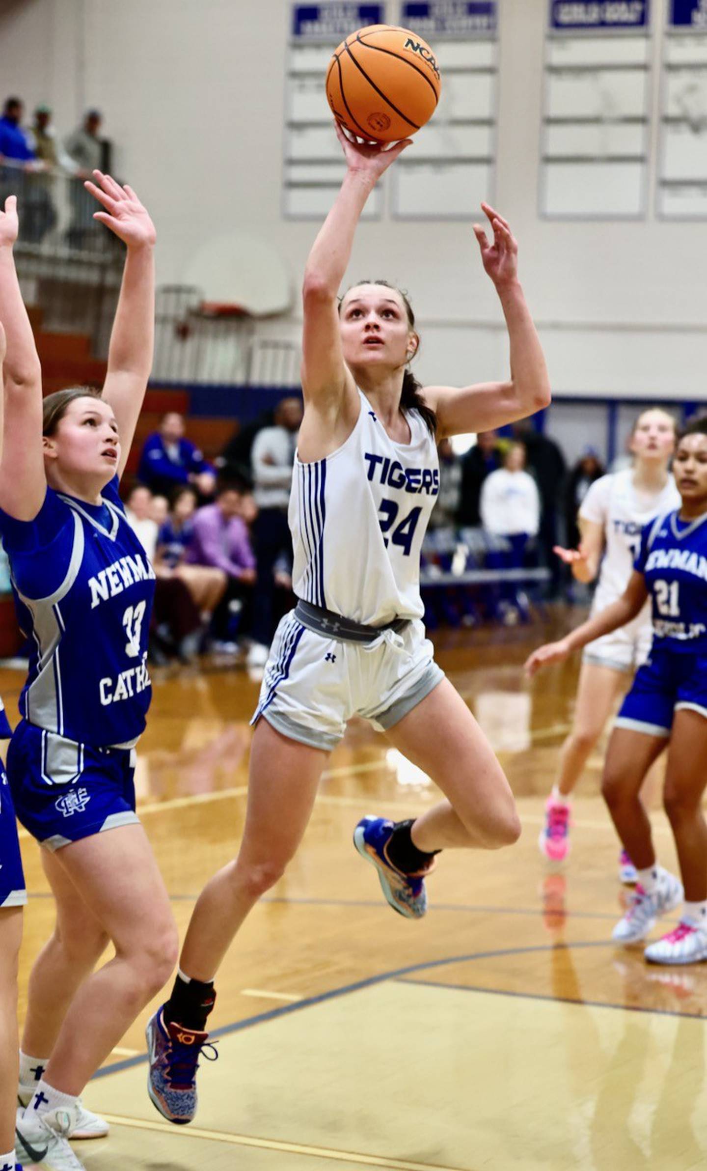 Princeton's Keighley Davis takes aim in the lane against Newman Saturday night at Prouty Gym. She broke the program scoring record with 1,506 career points.