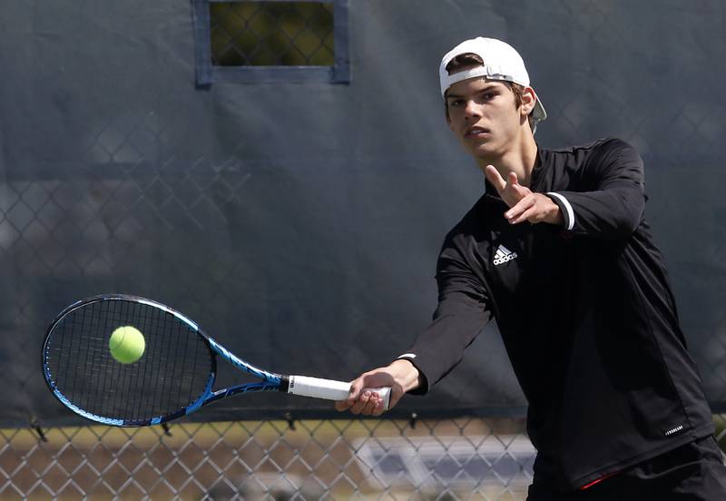 Batavia's TJ Stras returns the ball during an IHSA 2A boys doubles tennis match Thursday, May 25, 2023, at Buffalo Grove High School.