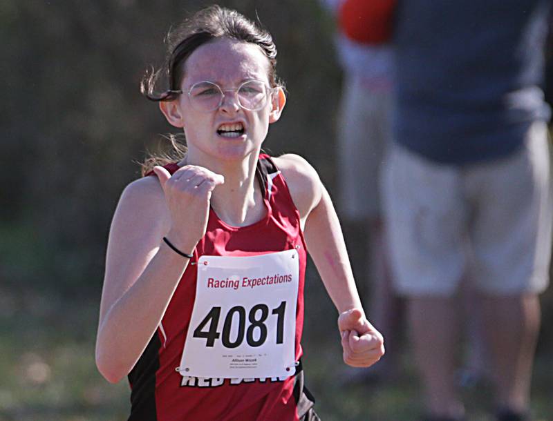 Hall's Allison Wozek runs in the Class 1A Regional Cross Country gils race on Saturday, Oct. 22, 2022 at the Seneca FFA Farm in Marseilles.