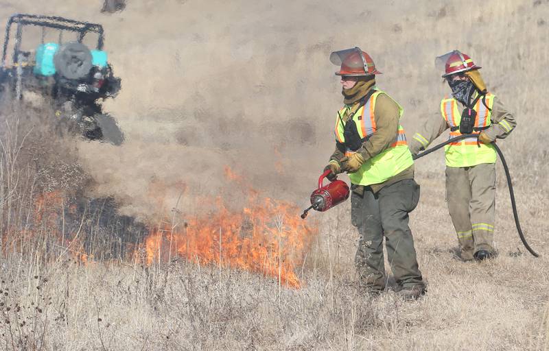 Crews from Semper FI Land Services. along with the help from the Illinois Department of Transportation, conduct a controlled burn at Deer Pit Prairie near the intersection of Interstate 39 and Illinois Route 251 on Monday, Feb. 10, 2025 near Oglesby. The burns are designed to clear out invasive plants and encourage the growth of native prairie vegetation. Other locations that IDOT has another scheduled future burns are Indian Boundary Prairie near Ohio in Bureau County.