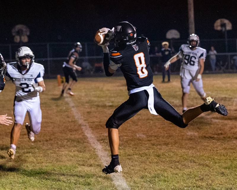 FCW's Grant Wissen (8) hauls in a two-point conversion pass Friday, Sept. 26, 2025, at the Wood Shed in rural Streator.