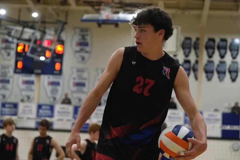 Roncall’s Brandon Louthain, a former Naperville native, gets ready to serve against Glenbard West in the Lincoln-Way East Tournament title match. Saturday, April 30, 2022, in Frankfort.