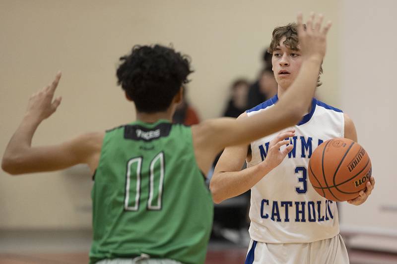 Newman's Ayden Batten looks to pass Monday, Nov. 21, 2022 while playing North Boone in the Oregon Thanksgiving Tournament.