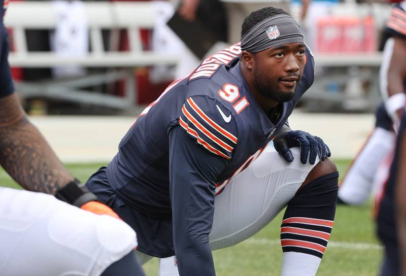 Chicago Bears defensive end Dominique Robinson stretches before the Bears take on the Kansas City Chiefs Sunday, Aug. 13, 2022, at Soldier Field in Chicago. The Bears beat the Kansas City Chiefs 19-14.