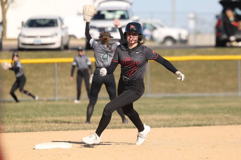 Bolingbrook’s Carly Schoop rounds second against Plainfield Central on Wednesday, March 20, 2024.