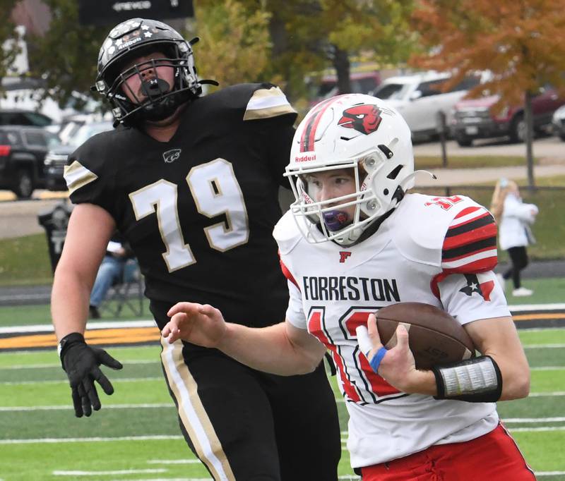 Forreston's Eli Ferris runs for a gain against Lena-Winslow in 1A playoff action at Lena on Saturday, Nov. 1, 2025.