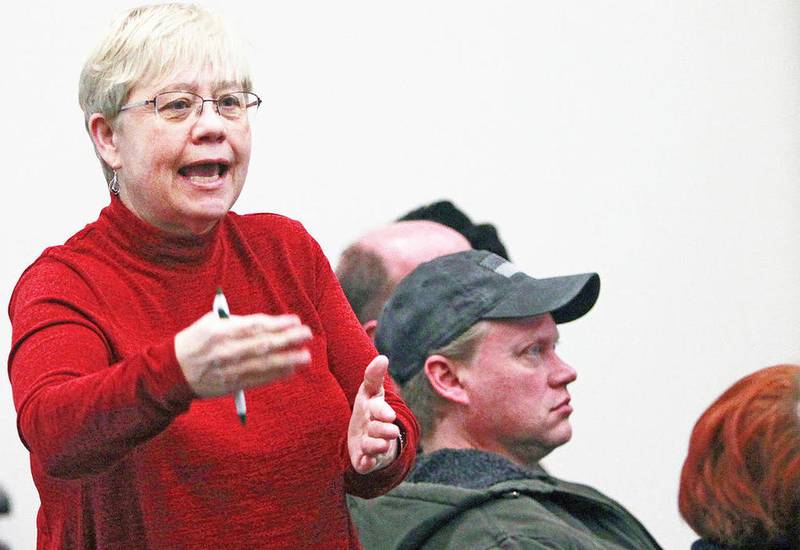 Mary Lou Claussen, of Round Lake stands up to talk about having confidence in yourself when looking for a job while attending, 5 Steps to Your Next Job, an interactive workshop presented by the Job Center of Lake County at the Warren-Newport Public Library in Gurnee.