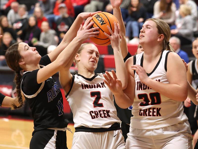 Indian Creek's Gretta Oziah grabs a rebound away from Rosary's Zoe Mesner Tuesday, Feb. 10, 2026, during their game at Indian Creek High School in Shabbona.