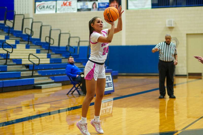 Batavia’s Hallie Crane (24) shoots a 3-pointer against York during a Class 4A Geneva Regional final basketball game at Geneva High School on Thursday, Feb. 20, 2025.
