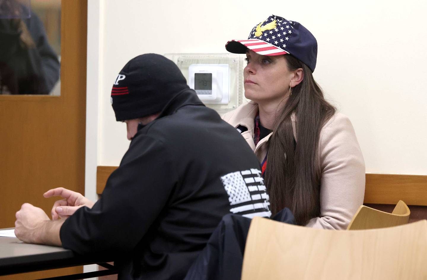 Robert and Katherine Anderson, of Earlville, attend the Somonauk Library board meeting Tuesday, Jan. 16, 2024, at the Somonauk Library to show their support of getting the visit by General Michael Thomas Flynn back on the schedule.