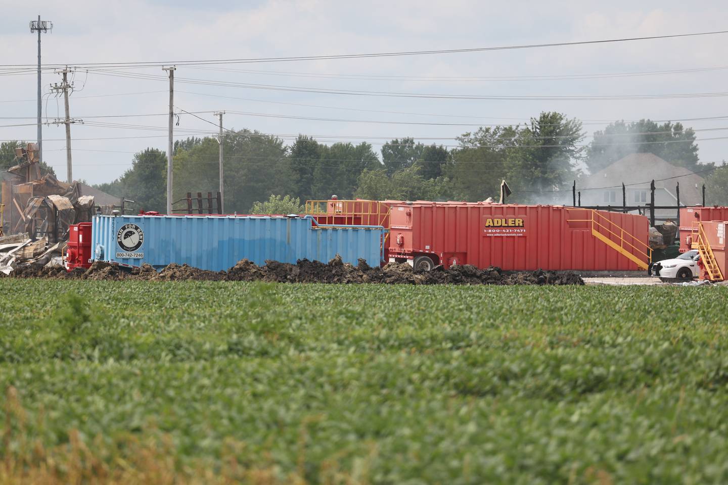 Waste containers sit on the property at the Tri-County Stockyard. The farm supply store burnt down early Tuesday, July 19th. Tuesday, July 26, 2022 in Shorewood.