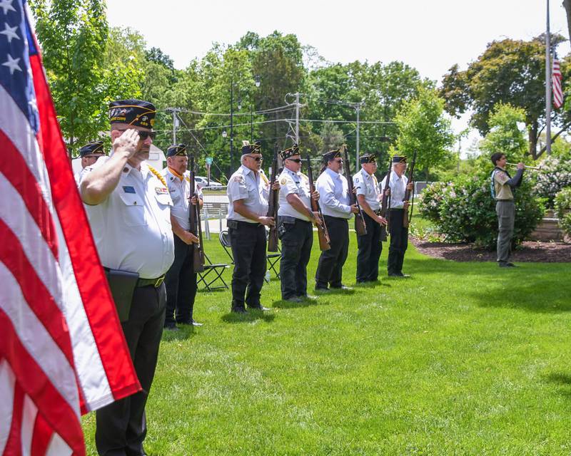 Yorkville American Legion Adjutant Brian Owens salutes as Taps was preformed by scout Christian Dominguez on Monday May 26, 2025, during the Memorial Day event held at Towns Square Park in Yorkville.