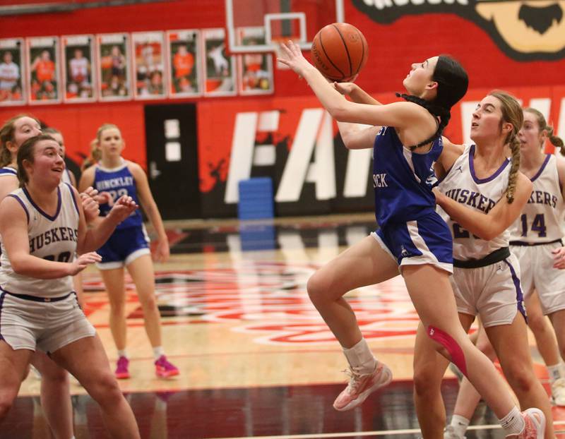 Hinckley-Big Rock's Mia Cotton sprints to the hoop as Serena's RayElle Brennan defends during the Little Ten Conference championship game on Friday, Jan. 24, 2025 at Earlville High School.