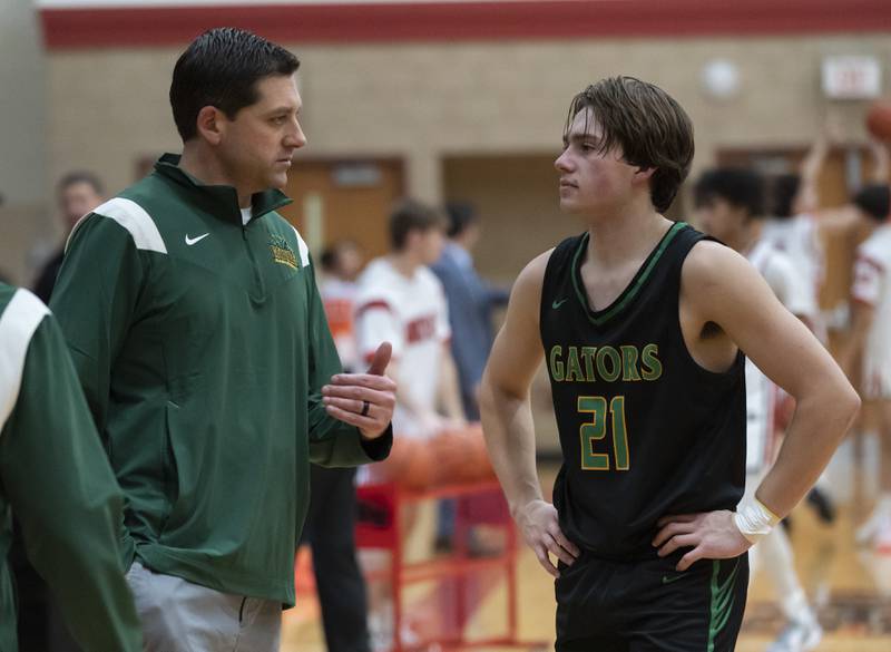 Crystal Lake South Head Coach Matt LePage talks with his son Cooper LePage during their game against Huntley on Friday, December 16, 2022 at Huntley High School. Ryan Rayburn for Shaw Local